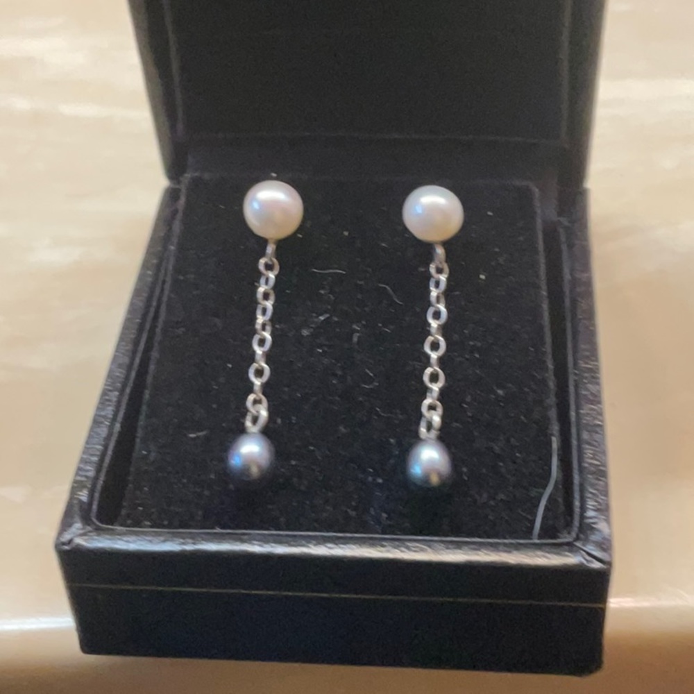 White and black freshwater pearls set in Sterling silver
